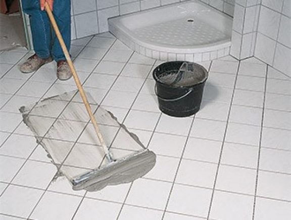 Application et lissage du coulis